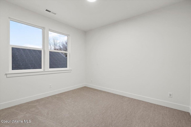 9151 N Raintree Ln, Hayden, ID 83835 - empty room featuring baseboards and carpet floors