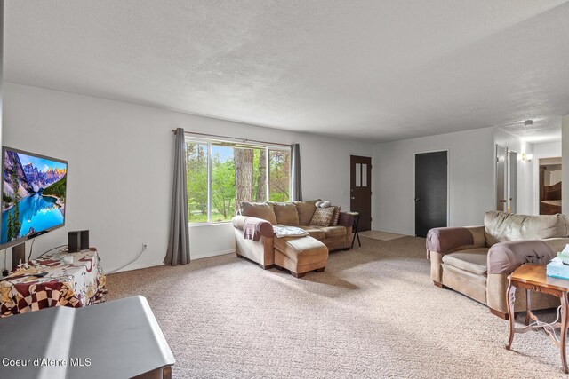15248 N Atlas Rd, Rathdrum, ID 83858 - carpeted living area featuring a textured ceiling