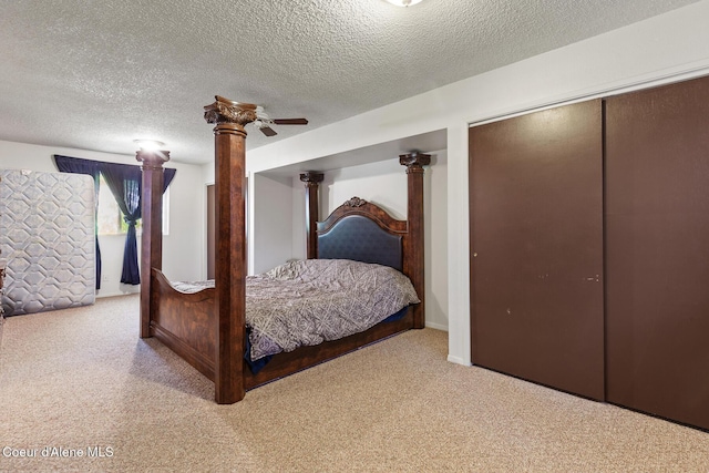 15248 N Atlas Rd, Rathdrum, ID 83858 - bedroom featuring carpet flooring, a textured ceiling, ceiling fan, and a closet
