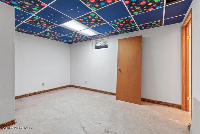 15248 N Atlas Rd, Rathdrum, ID 83858 - empty room with unfinished concrete flooring and baseboards