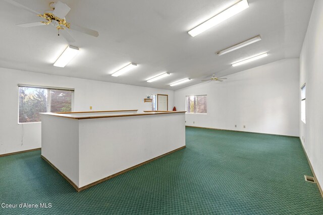 15248 N Atlas Rd, Rathdrum, ID 83858 - carpeted empty room with ceiling fan, vaulted ceiling, and baseboards