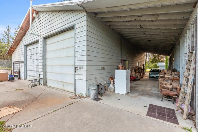 15248 N Atlas Rd, Rathdrum, ID 83858 - garage with an attached carport