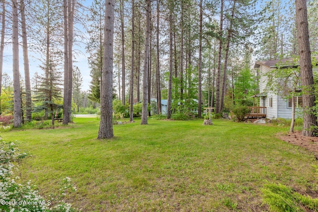 15248 N Atlas Rd, Rathdrum, ID 83858 - view of grassy yard featuring a deck