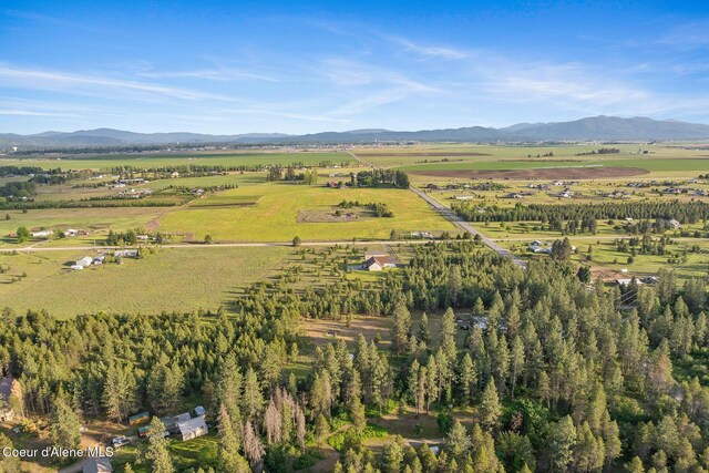 15248 N Atlas Rd, Rathdrum, ID 83858 - view of property location featuring rural landscape, a mountain backdrop, and rows of crops