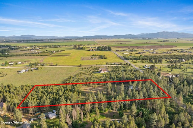 15248 N Atlas Rd, Rathdrum, ID 83858 - aerial view of sparsely populated area with mountains and property boundaries highlighted