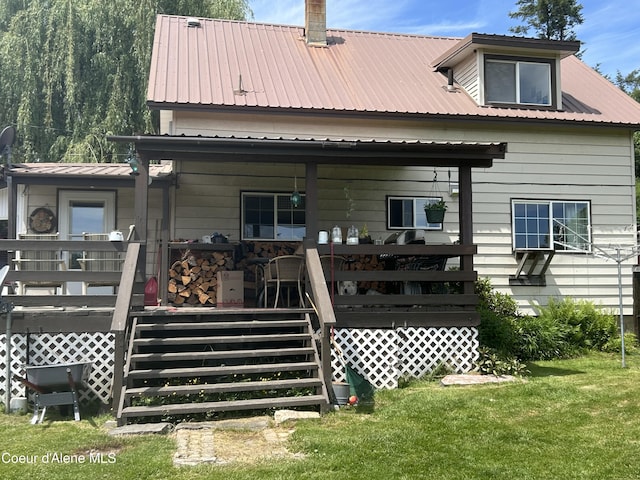 344 N 20th St, Saint Maries, ID 83861 - rear view of property with a lawn, metal roof, a wooden deck, and stairway