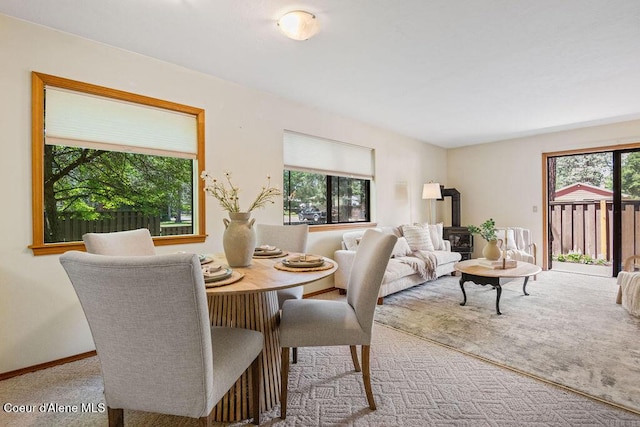 1130 E Timber Ln # 2, Coeur Dalene, ID 83815 - carpeted dining area featuring baseboards