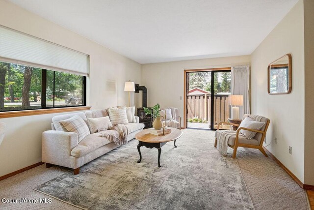 1130 E Timber Ln # 2, Coeur Dalene, ID 83815 - carpeted living area with baseboards