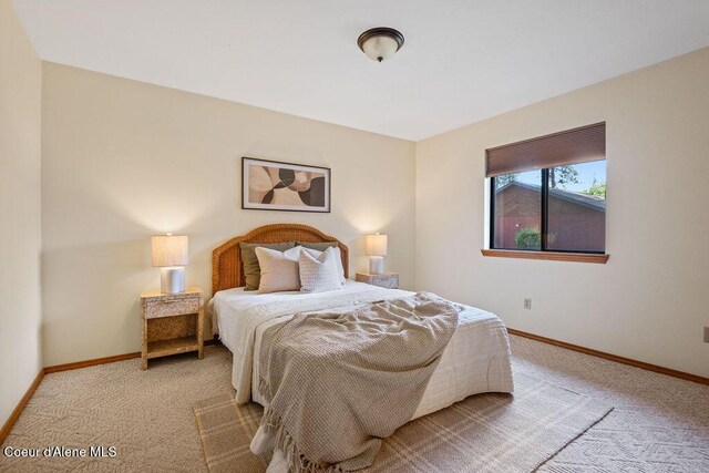 1130 E Timber Ln # 2, Coeur Dalene, ID 83815 - bedroom featuring carpet floors and baseboards