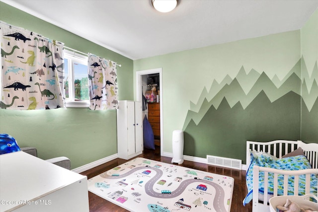 316 W Brown Ave, Kellogg, ID 83837 - bedroom with wood finished floors and baseboards