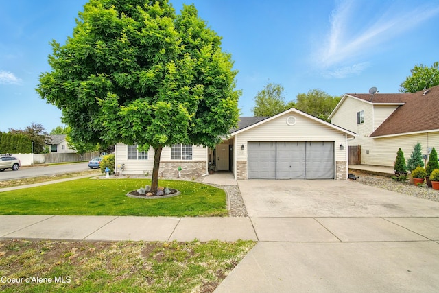500 N Elm Rd, Post Falls, ID 83854 - view of front of house with a garage, driveway, and brick siding