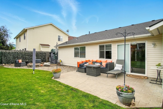 500 N Elm Rd, Post Falls, ID 83854 - rear view of house featuring outdoor lounge area, a patio area, and roof with shingles