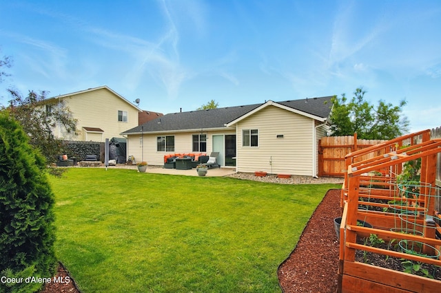 500 N Elm Rd, Post Falls, ID 83854 - rear view of property with outdoor lounge area, a garden, and a patio area
