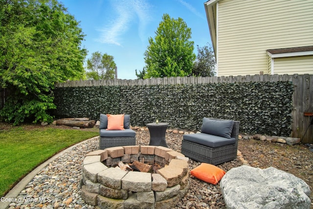 500 N Elm Rd, Post Falls, ID 83854 - fenced backyard with a fire pit