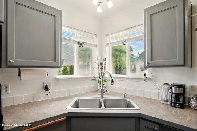 500 N Elm Rd, Post Falls, ID 83854 - kitchen featuring gray cabinetry, a sink, and light countertops