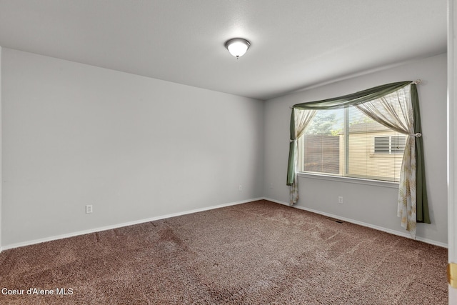 175 E Jeffrey Pine Ln, Coeur Dalene, ID 83815 - empty room featuring carpet floors and baseboards