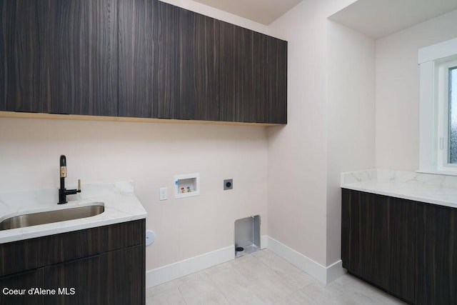 2671 W Lumber Ln, Coeur Dalene, ID 83814 - washroom with cabinet space, washer hookup, baseboards, and hookup for an electric dryer