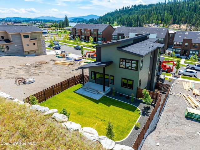2671 W Lumber Ln, Coeur Dalene, ID 83814 - aerial perspective of suburban area featuring a mountain backdrop