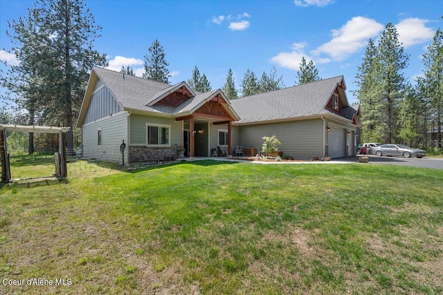 23378 N Prominence Rd, Rathdrum, ID 83858 - craftsman-style home featuring driveway, board and batten siding, and a garage