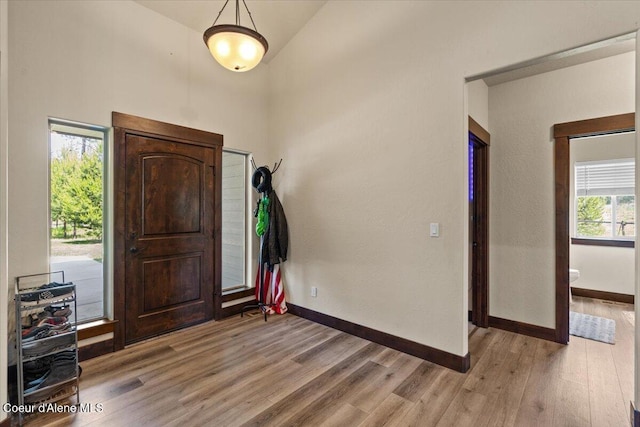 23378 N Prominence Rd, Rathdrum, ID 83858 - foyer entrance with light wood-style floors and a towering ceiling
