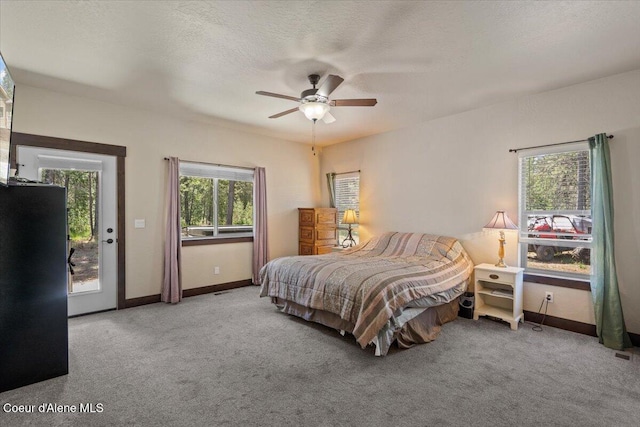 23378 N Prominence Rd, Rathdrum, ID 83858 - bedroom featuring carpet, a ceiling fan, and access to exterior