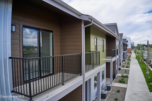 1048 E 4th Ave, Post Falls, ID 83854 - view of side of home featuring central AC unit