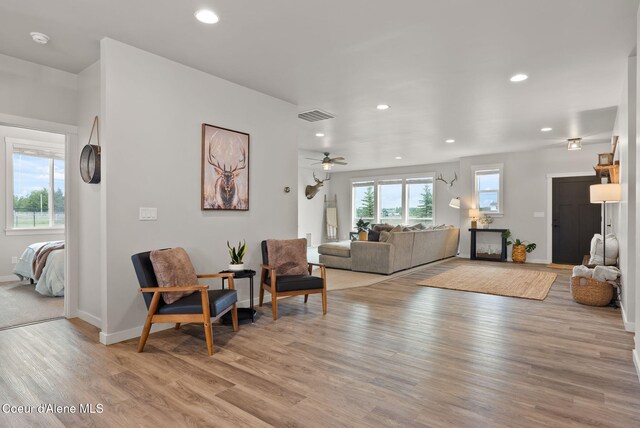 27455 N Caribou Ave, Athol, ID 83801 - living area with light wood-style flooring, baseboards, recessed lighting, and a ceiling fan