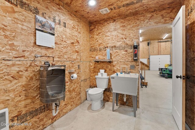 27455 N Caribou Ave, Athol, ID 83801 - bathroom with toilet, concrete flooring, and recessed lighting
