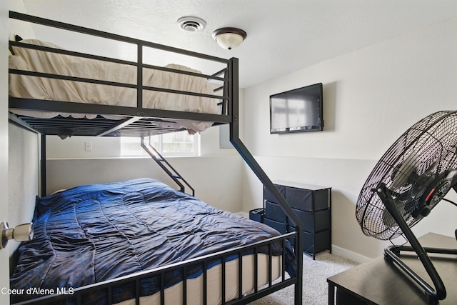 15272 N Stevens St, Rathdrum, ID 83858 - bedroom featuring light colored carpet and baseboards
