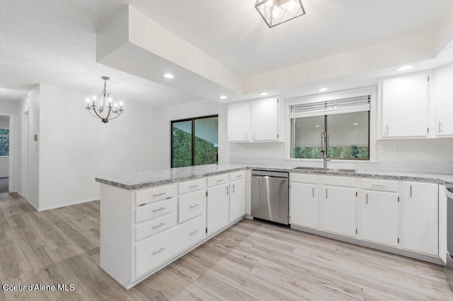16 Beers Humbird Rd, Sagle, ID 83860 - kitchen featuring stainless steel dishwasher, a peninsula, white cabinetry, light wood-style floors, and recessed lighting