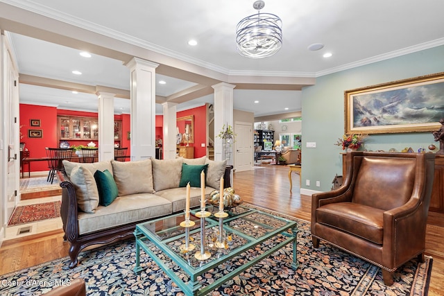 2177 E Totten Ln, Dalton Gardens, ID 83815 - living area with decorative columns, wood finished floors, ornamental molding, recessed lighting, and baseboards