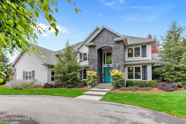 2177 E Totten Ln, Dalton Gardens, ID 83815 - view of front of home with a front lawn and roof with shingles