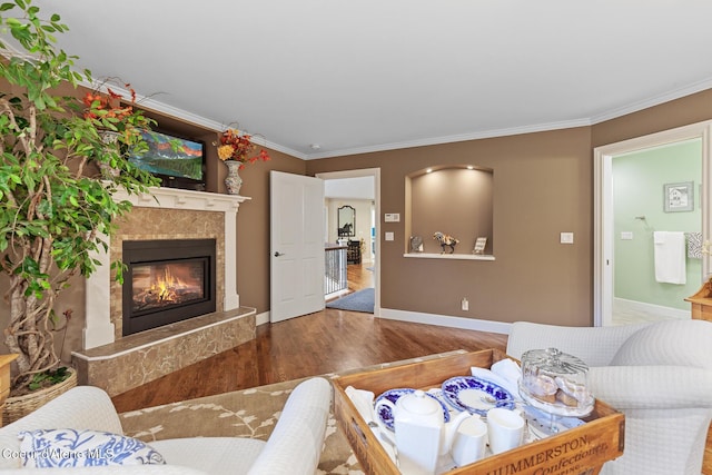 2177 E Totten Ln, Dalton Gardens, ID 83815 - living area with wood finished floors, a premium fireplace, crown molding, and baseboards