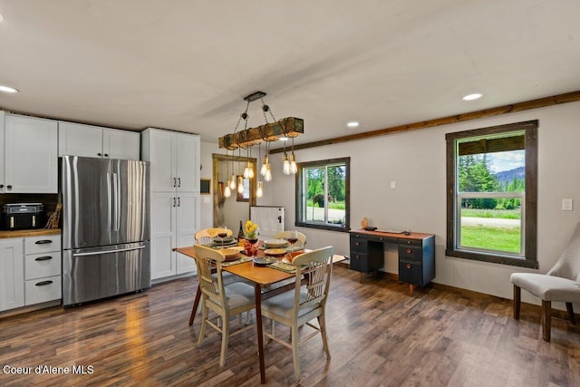 929 Irish Rd, Sagle, ID 83860 - dining room featuring dark wood-type flooring, recessed lighting, and baseboards