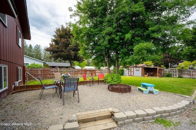 8525 W Nevada St, Rathdrum, ID 83858 - view of patio / terrace featuring an outdoor fire pit and outdoor dining area