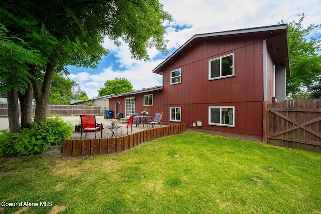 8525 W Nevada St, Rathdrum, ID 83858 - back of property featuring a patio area
