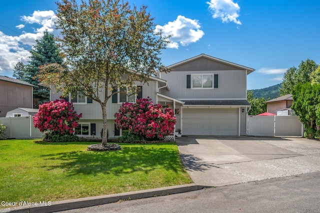 1961 E Sundance Dr, Post Falls, ID 83854 - view of front of property with an attached garage and concrete driveway