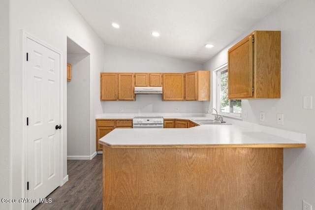 7349 W Crenshaw St, Rathdrum, ID 83858 - kitchen featuring a sink, under cabinet range hood, white range with electric stovetop, a peninsula, and light countertops