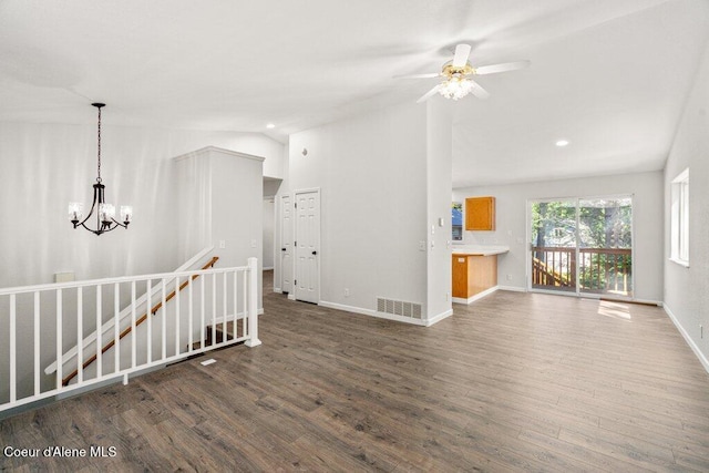 7349 W Crenshaw St, Rathdrum, ID 83858 - unfurnished room with wood finished floors, a chandelier, recessed lighting, a ceiling fan, and baseboards