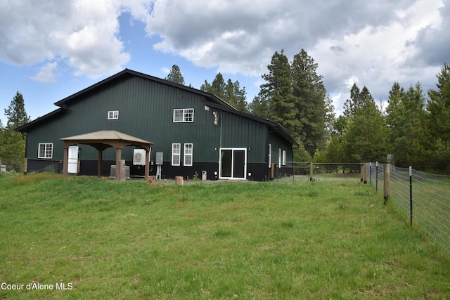 574 Parkside Rd, Plummer, ID 83851 - rear view of property with a gazebo and board and batten siding