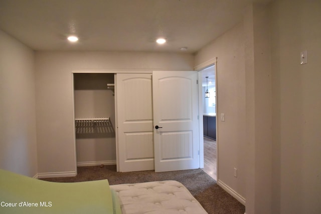 574 Parkside Rd, Plummer, ID 83851 - unfurnished bedroom with carpet flooring, a closet, baseboards, and recessed lighting