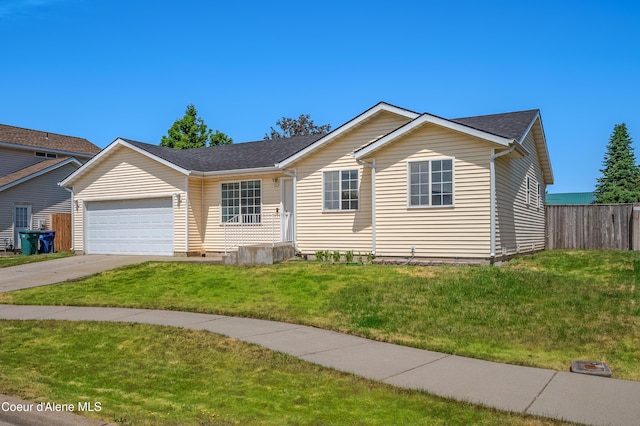 321 E Acorn Ave, Coeur Dalene, ID 83814 - view of front of property with a garage, concrete driveway, and roof with shingles