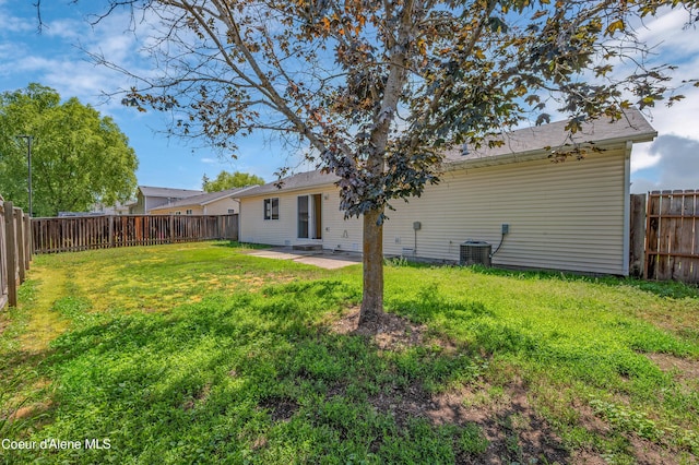 321 E Acorn Ave, Coeur Dalene, ID 83814 - rear view of property featuring a patio and central AC
