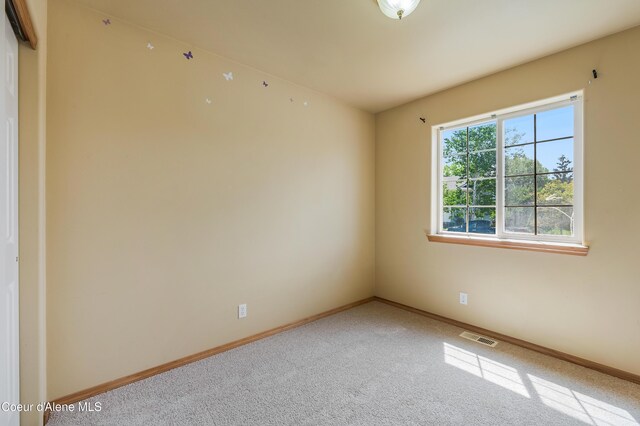 321 E Acorn Ave, Coeur Dalene, ID 83814 - carpeted spare room featuring baseboards