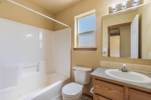 321 E Acorn Ave, Coeur Dalene, ID 83814 - bathroom featuring toilet, vanity, and shower / bath combination