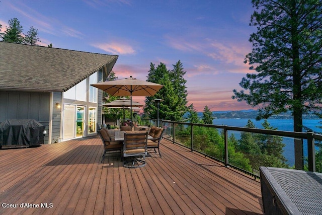 4987 S Bay Pointe Way, Coeur Dalene, ID 83814 - wooden deck with a water view, area for grilling, and outdoor dining area