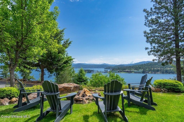 4987 S Bay Pointe Way, Coeur Dalene, ID 83814 - view of green lawn with a water and mountain view