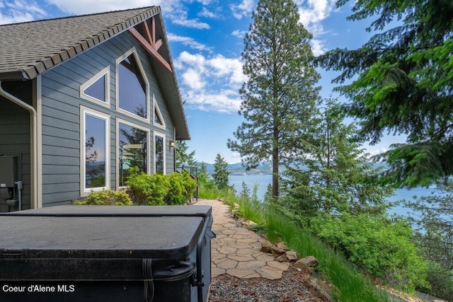 4987 S Bay Pointe Way, Coeur Dalene, ID 83814 - view of side of home with a water view