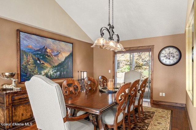 4987 S Bay Pointe Way, Coeur Dalene, ID 83814 - dining space featuring vaulted ceiling, a chandelier, wood finished floors, and baseboards