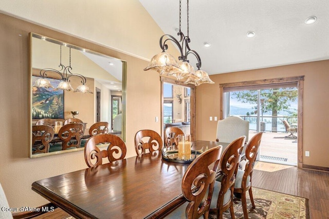 4987 S Bay Pointe Way, Coeur Dalene, ID 83814 - dining room with a chandelier, vaulted ceiling, recessed lighting, and wood finished floors